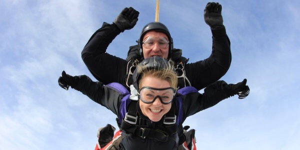 Skydivers falling through the sky