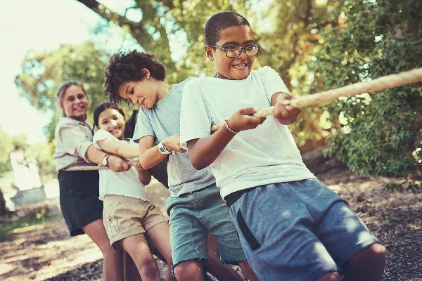 Children playing rope tug-of-war