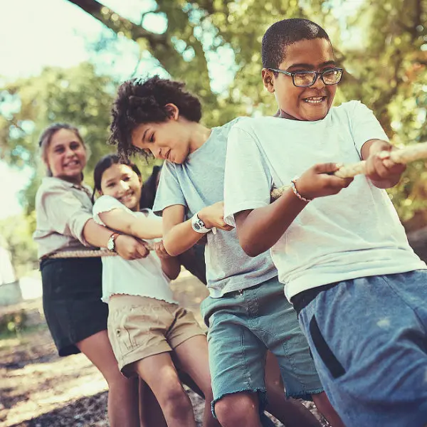 Children playing rope tug-of-war